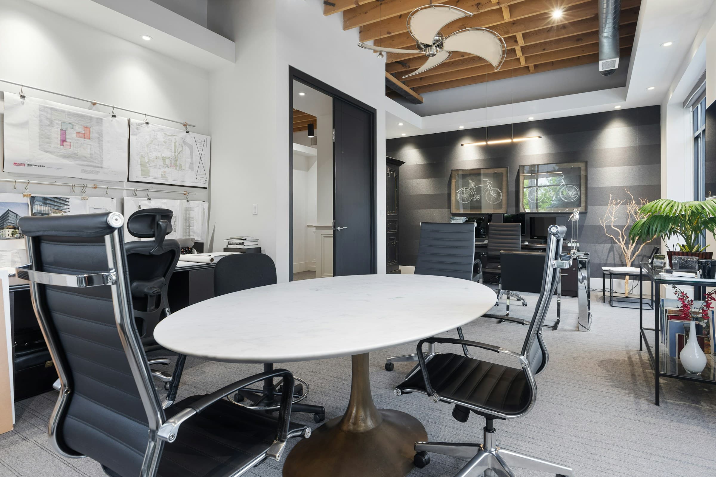 A community committee meeting room arranged around a conference table.